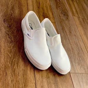 Brand New white slip on vans
